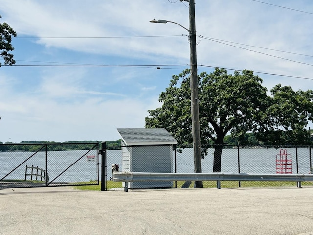 7710 E Sunset Dr, Wonder Lake, IL 60097 - water view with a gate