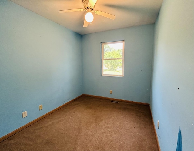 7710 E Sunset Dr, Wonder Lake, IL 60097 - spare room with carpet floors and a ceiling fan