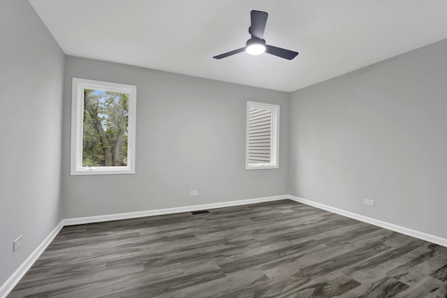 5701 Foxgate Ln, Hinsdale, IL 60521 - spare room featuring baseboards, dark wood-style flooring, and a ceiling fan