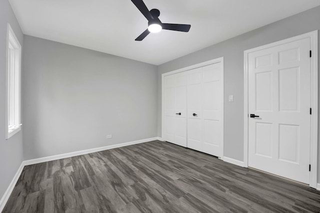 5701 Foxgate Ln, Hinsdale, IL 60521 - unfurnished bedroom with baseboards, a closet, dark wood finished floors, and a ceiling fan