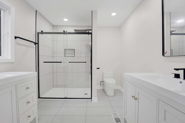 5701 Foxgate Ln, Hinsdale, IL 60521 - full bath featuring two vanities, a stall shower, tile patterned floors, and recessed lighting