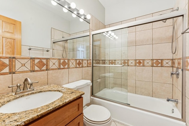 2538 W Flournoy St Unit 3, Chicago, IL 60612 - bathroom with tile walls, vanity, and enclosed tub / shower combo