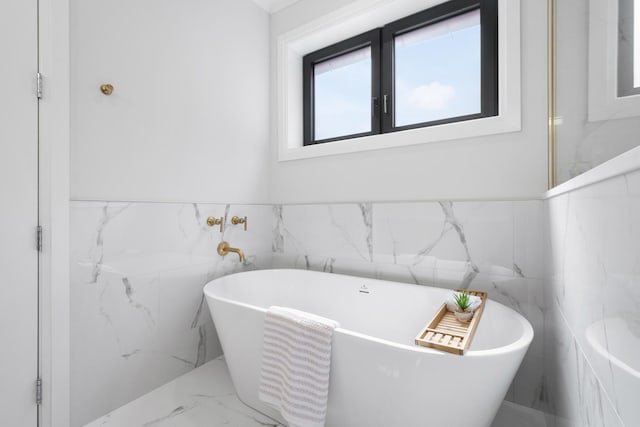 1834 N Hudson Ave Unit 2, Chicago, IL 60614 - full bathroom featuring tile walls, marble tiled floors, a freestanding bath, and a wainscoted wall