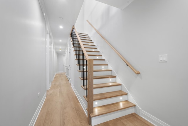 1834 N Hudson Ave Unit 2, Chicago, IL 60614 - stairway with wood finished floors, baseboards, and recessed lighting
