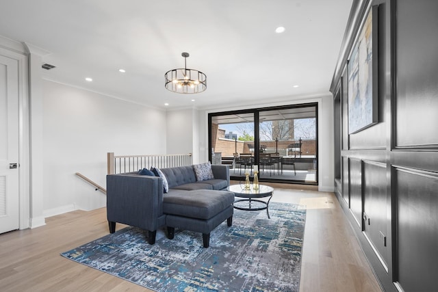 1834 N Hudson Ave Unit 2, Chicago, IL 60614 - living room with a chandelier, light wood-style flooring, crown molding, baseboards, and recessed lighting