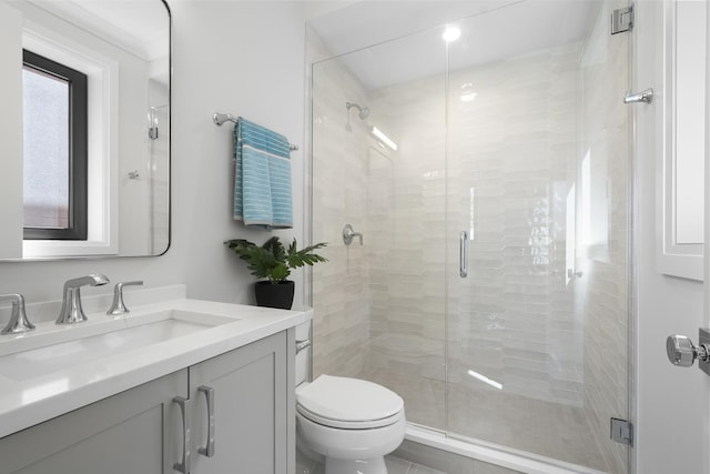 1834 N Hudson Ave Unit 2, Chicago, IL 60614 - bathroom with vanity, a stall shower, and toilet