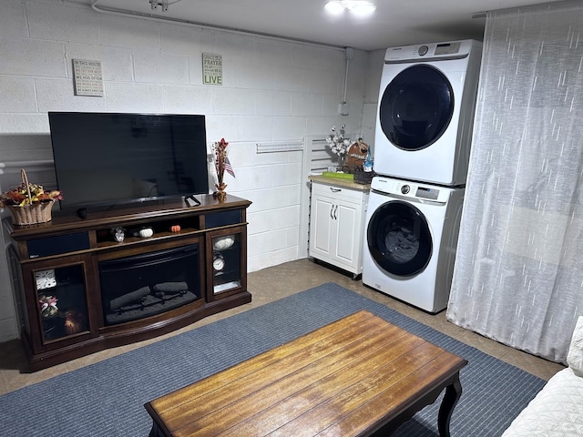 320 Sheridan Dr Unit 2C, Willowbrook, IL 60527 - washroom with estacked washer and dryer and concrete block wall
