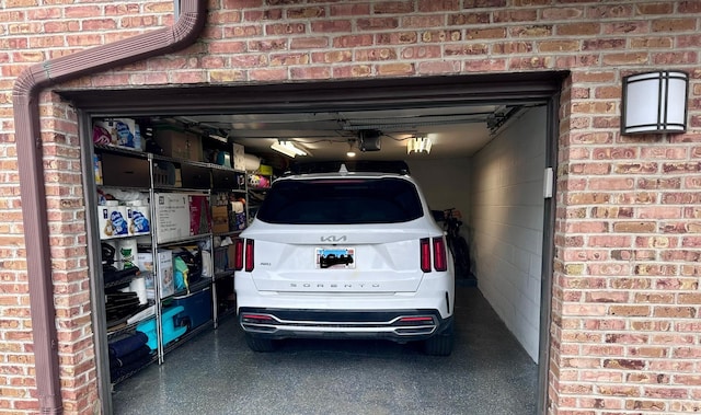 320 Sheridan Dr Unit 2C, Willowbrook, IL 60527 - garage featuring a garage door opener