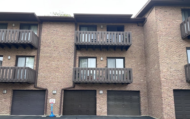 320 Sheridan Dr Unit 2C, Willowbrook, IL 60527 - view of property featuring an attached garage