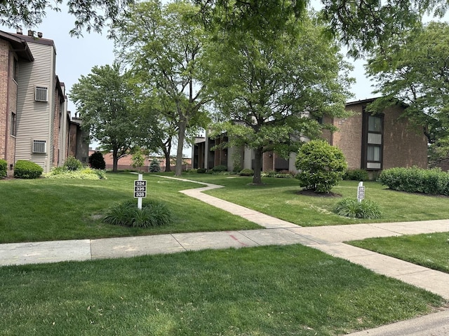 320 Sheridan Dr Unit 2C, Willowbrook, IL 60527 - view of community featuring a lawn
