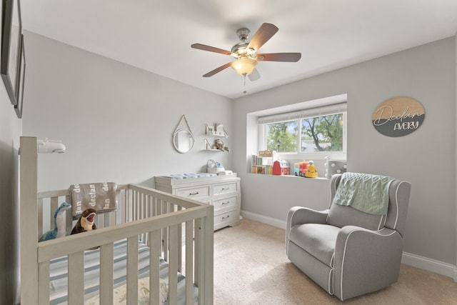 1122 N Cardinal Dr, Palatine, IL 60074 - bedroom with a crib, baseboards, carpet flooring, and ceiling fan