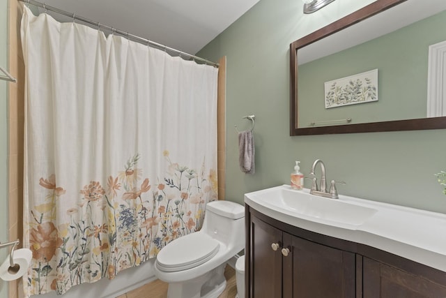 1122 N Cardinal Dr, Palatine, IL 60074 - full bathroom with toilet, vanity, wood finished floors, and shower / tub combo
