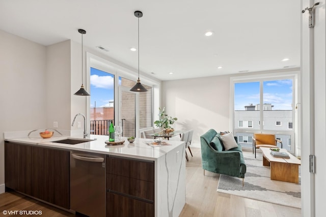 2342 W Adams St Unit 406, Chicago, IL 60612 - kitchen featuring a sink, modern cabinets, dishwasher, plenty of natural light, and recessed lighting