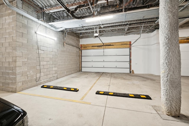 2342 W Adams St Unit 406, Chicago, IL 60612 - garage featuring a garage door opener