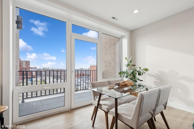 2342 W Adams St Unit 406, Chicago, IL 60612 - dining area with plenty of natural light, light wood finished floors, baseboards, and recessed lighting