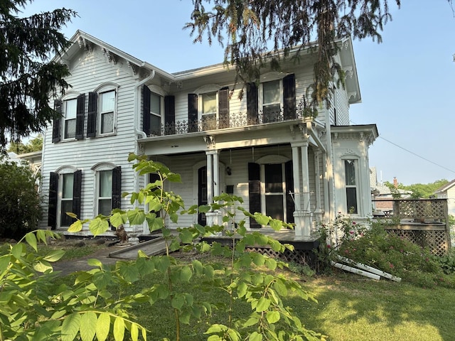 115 N Clay St, Mount Carroll, IL 61053 - italianate house with a porch and a balcony