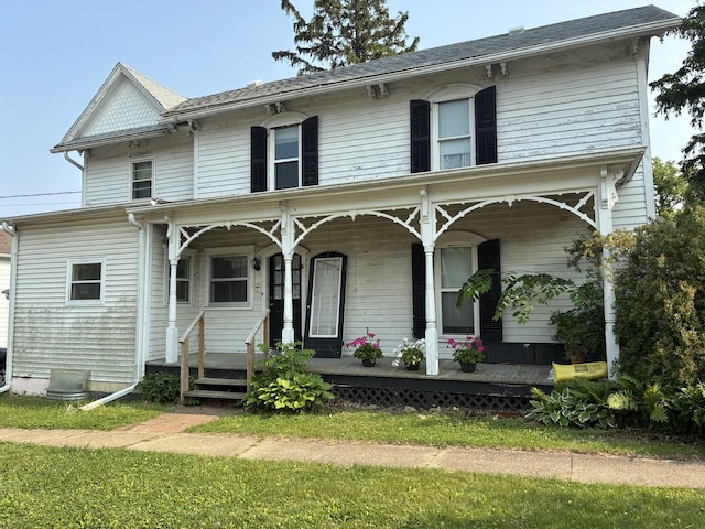 115 N Clay St, Mount Carroll, IL 61053 - view of front facade featuring covered porch