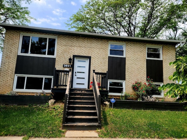 3601 W 123rd Pl, Alsip, IL 60803 - raised ranch with board and batten siding and brick siding