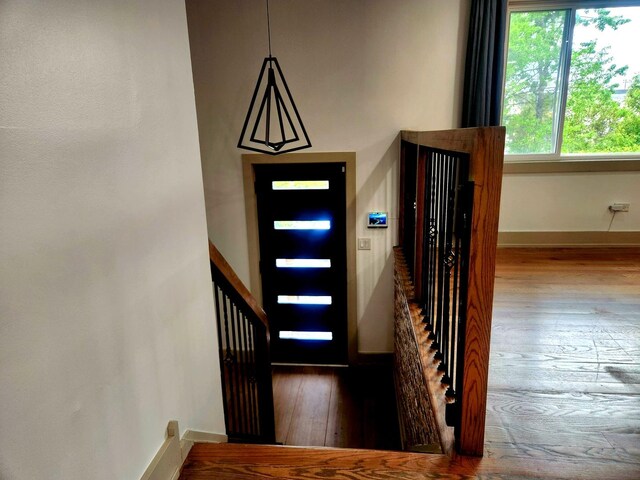 3601 W 123rd Pl, Alsip, IL 60803 - stairs featuring hardwood / wood-style flooring and baseboards