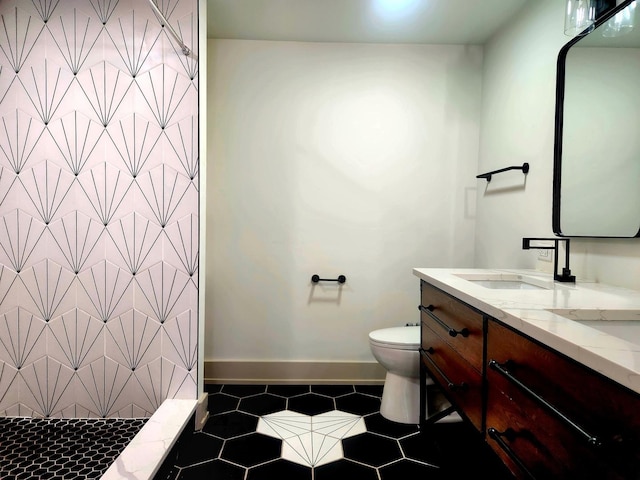 3601 W 123rd Pl, Alsip, IL 60803 - bathroom with vanity, a tile shower, toilet, baseboards, and tile patterned flooring