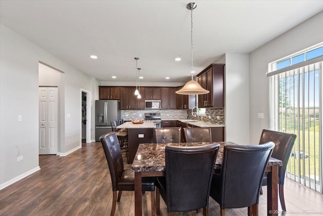 25734 Galway Ave, Plainfield, IL 60585 - dining space with dark wood-style flooring, recessed lighting, and baseboards