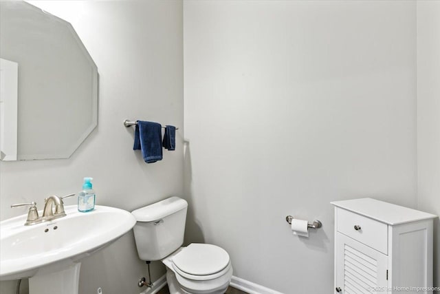 25734 Galway Ave, Plainfield, IL 60585 - half bathroom featuring toilet and a sink