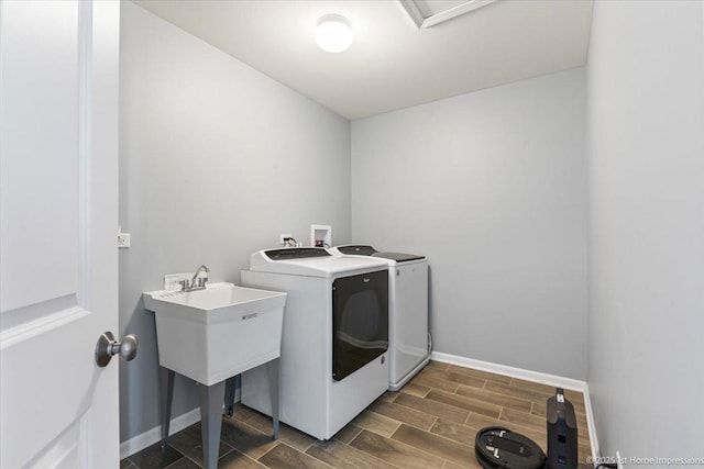 25734 Galway Ave, Plainfield, IL 60585 - laundry room featuring separate washer and dryer, baseboards, and wood tiled floors