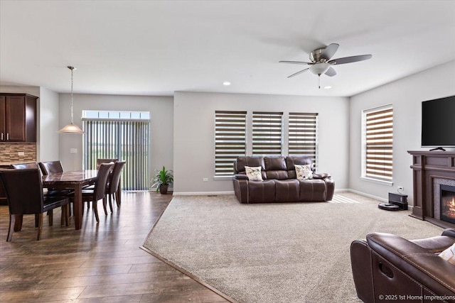 25734 Galway Ave, Plainfield, IL 60585 - living area with a ceiling fan, a premium fireplace, baseboards, dark wood-style floors, and recessed lighting