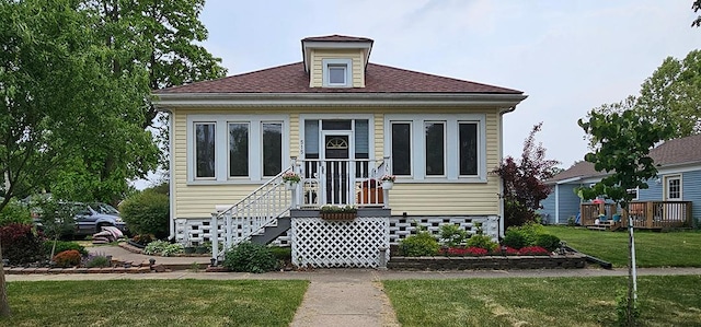 515 E Main St E, Amboy, IL 61310 - bungalow with a front yard