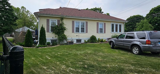 515 E Main St E, Amboy, IL 61310 - view of side of property featuring a yard and central air condition unit