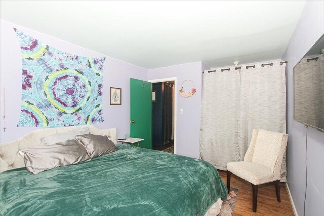 9204 Bumble Bee Dr Unit 1H, Des Plaines, IL 60016 - bedroom featuring wood finished floors