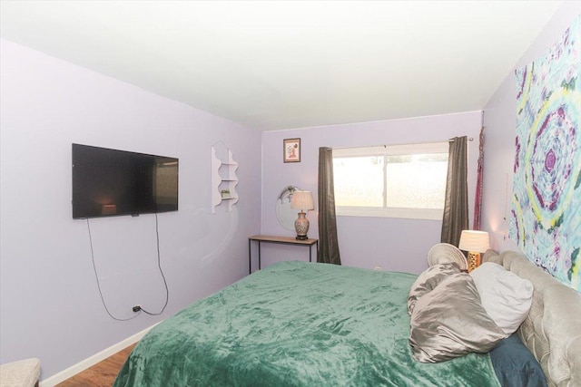 9204 Bumble Bee Dr Unit 1H, Des Plaines, IL 60016 - bedroom with wood finished floors and baseboards