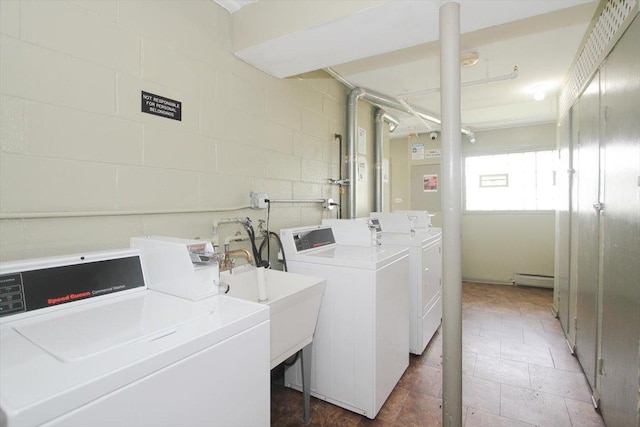 9204 Bumble Bee Dr Unit 1H, Des Plaines, IL 60016 - community laundry featuring separate washer and dryer, a baseboard heating unit, and concrete block wall