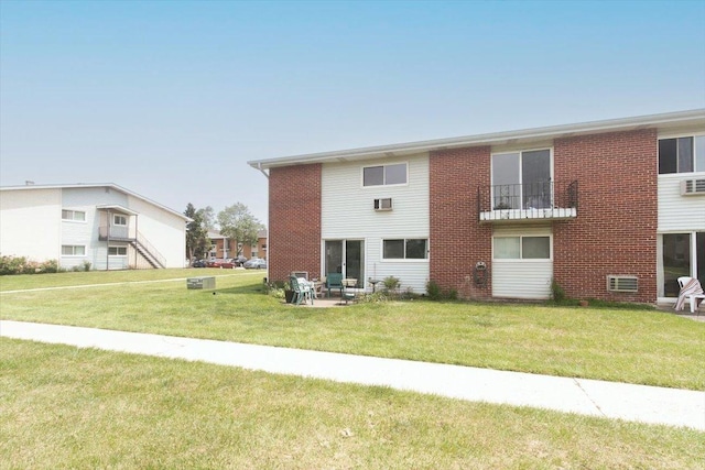 9204 Bumble Bee Dr Unit 1H, Des Plaines, IL 60016 - back of property with brick siding and a yard