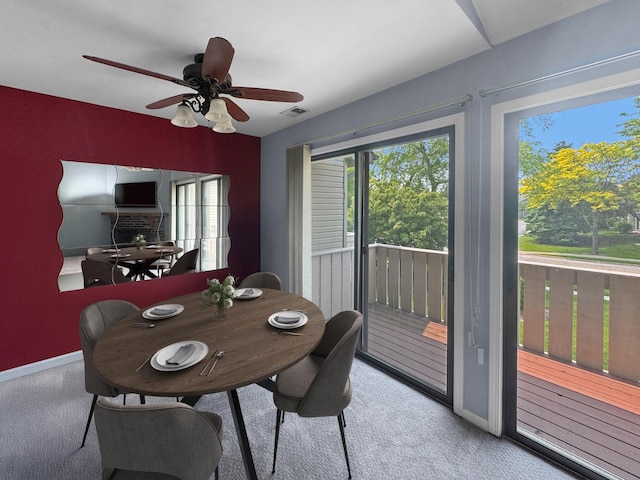 1388 Stratford Dr Unit 12-C-2, Gurnee, IL 60031 - dining room with carpet floors, baseboards, and a ceiling fan