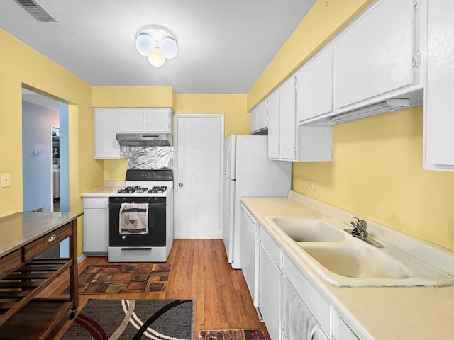 1388 Stratford Dr Unit 12-C-2, Gurnee, IL 60031 - kitchen with range with gas cooktop, under cabinet range hood, dark wood finished floors, and white cabinetry