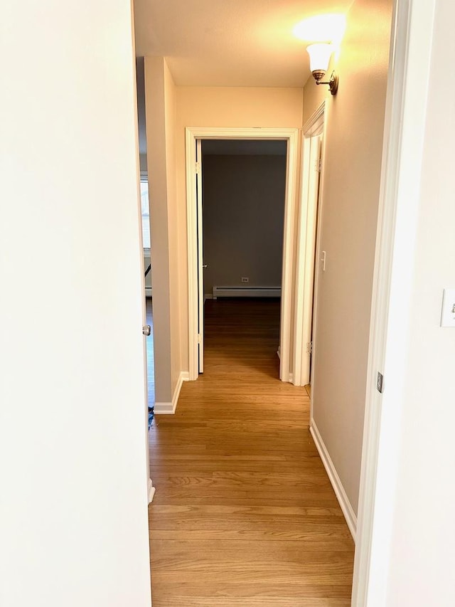 406 Franklin Ave Unit 2A, River Forest, IL 60305 - corridor with baseboard heating, light wood-style floors, and baseboards