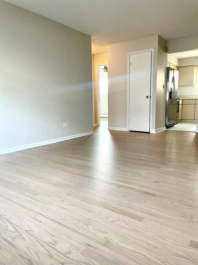 406 Franklin Ave Unit 2A, River Forest, IL 60305 - empty room with baseboards and light wood-style flooring