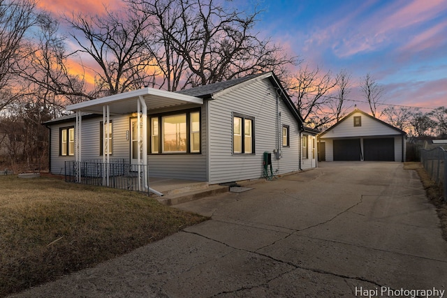 2610 S Thomas Ct, Mchenry, IL 60051 - view of front of house with a porch, a garage, an outbuilding, and a front yard
