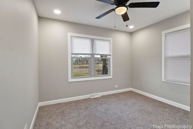 2610 S Thomas Ct, Mchenry, IL 60051 - carpeted spare room with baseboards, a ceiling fan, and recessed lighting