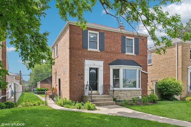 5146 N Mobile Ave, Chicago, IL 60630 - view of front of property with a gate, brick siding, and a chimney