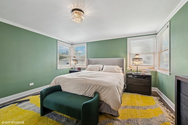 5146 N Mobile Ave, Chicago, IL 60630 - bedroom featuring ornamental molding, baseboards, and wood finished floors