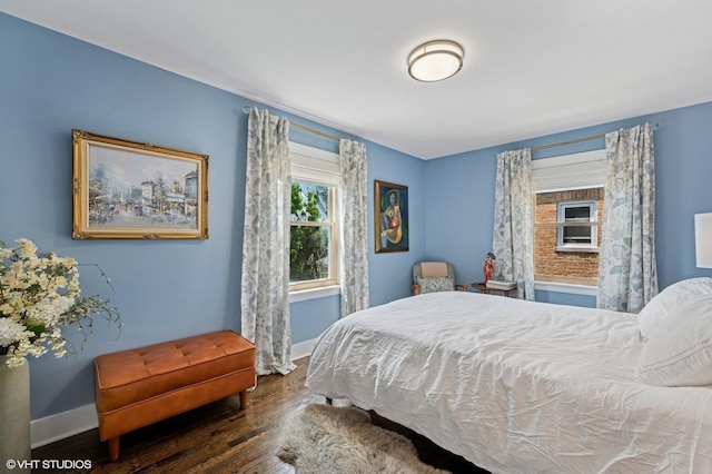 5146 N Mobile Ave, Chicago, IL 60630 - bedroom with baseboards and wood finished floors