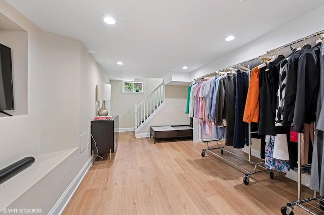 5146 N Mobile Ave, Chicago, IL 60630 - walk in closet featuring wood finished floors