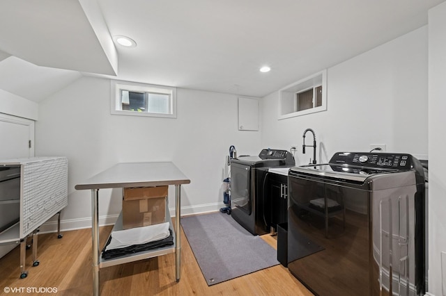 5146 N Mobile Ave, Chicago, IL 60630 - laundry room featuring light wood-type flooring, baseboards, and recessed lighting