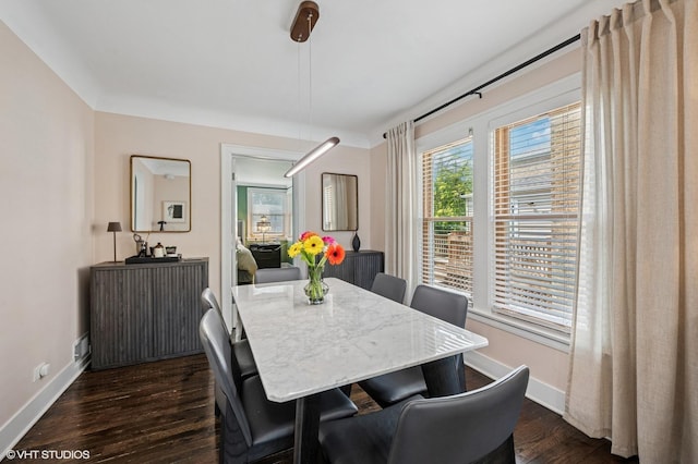 5146 N Mobile Ave, Chicago, IL 60630 - dining room featuring dark wood-style flooring and baseboards