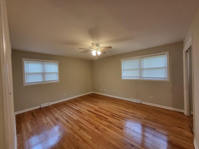 2913 Balmoral Cres, Flossmoor, IL 60422 - empty room with light wood-style floors and a ceiling fan
