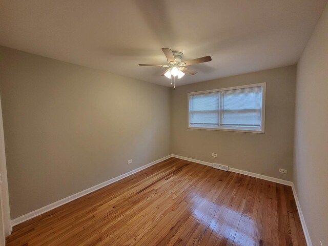 2913 Balmoral Cres, Flossmoor, IL 60422 - unfurnished bedroom with light wood-style floors, a closet, and ceiling fan