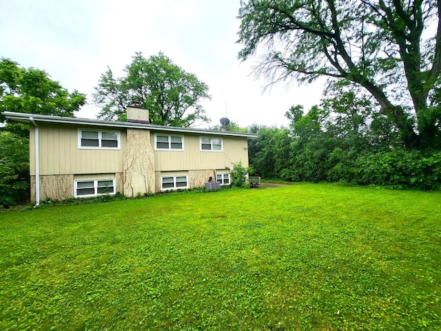 2913 Balmoral Cres, Flossmoor, IL 60422 - rear view of property with a chimney and a yard