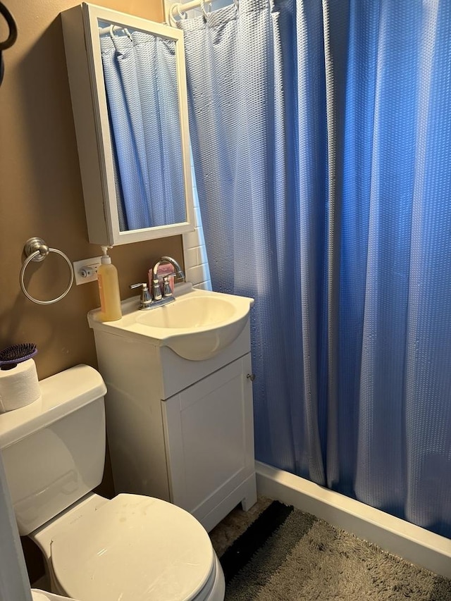 220 Harrison St, Carpentersville, IL 60110 - bathroom with toilet, vanity, and a shower with shower curtain